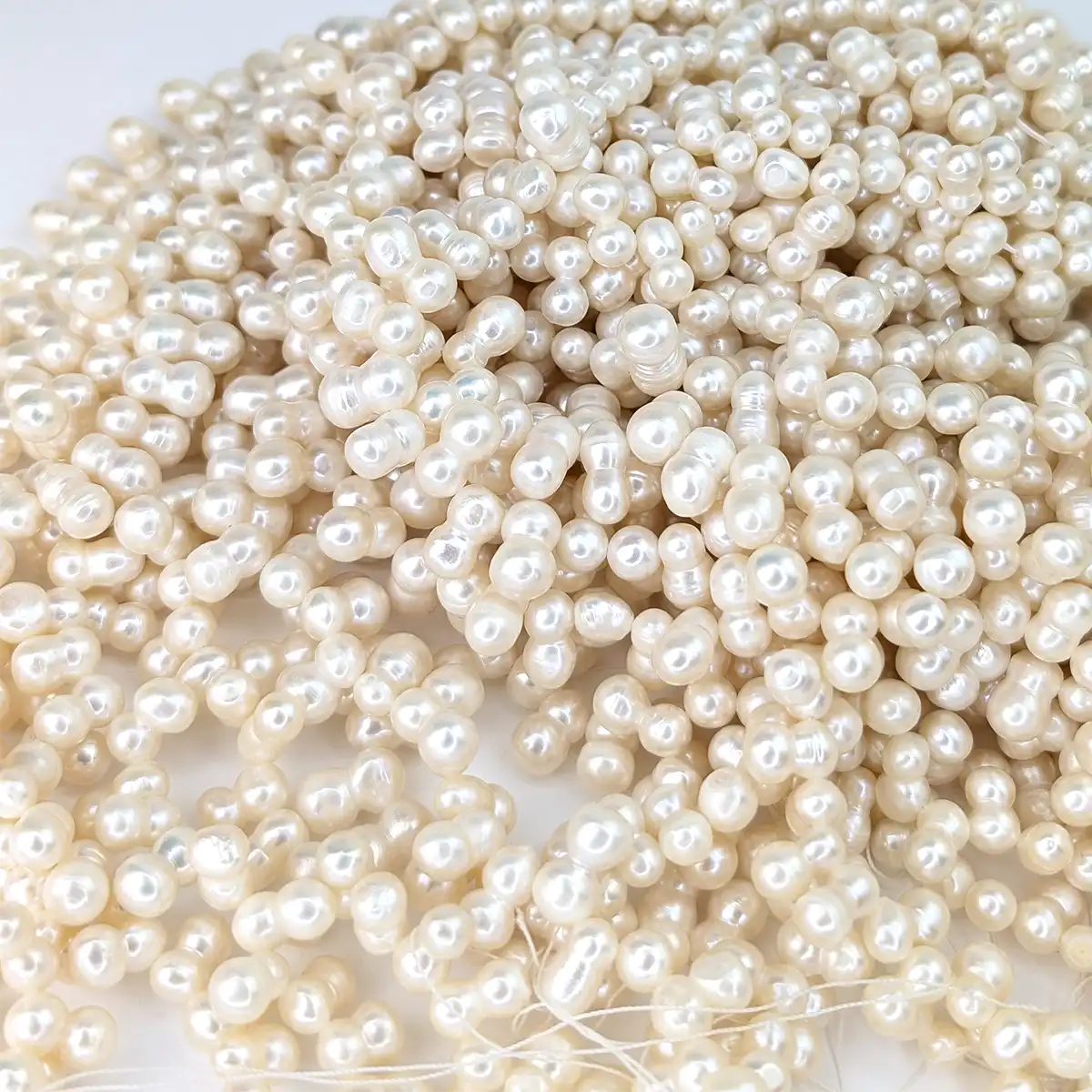 Peanut-shaped Freshwater Pearl String 7.5 x 13mm - Image 2