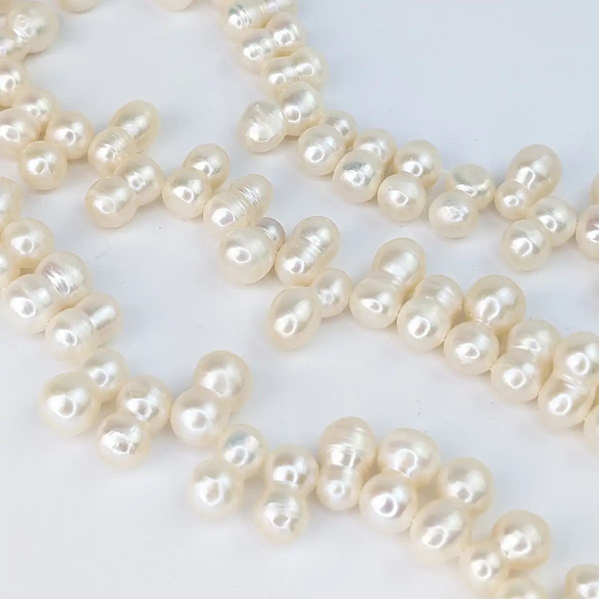 Peanut-shaped Freshwater Pearl String 7.5 x 13mm - Image 3