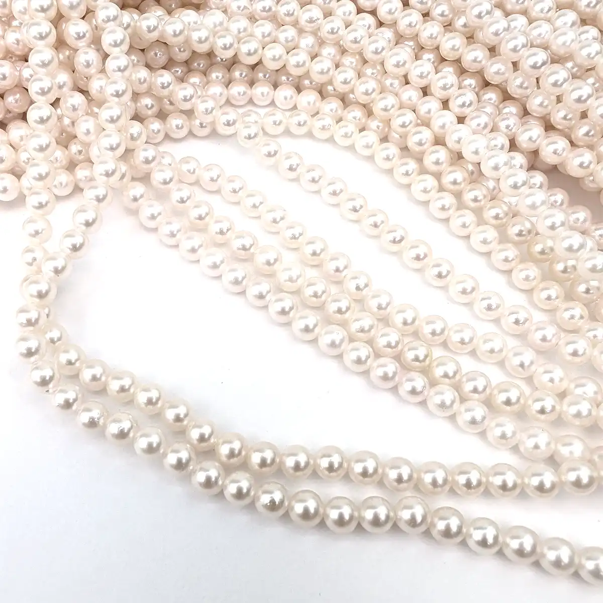 4-4.5mm High-Lustre Round Akoya Pearls - Image 4