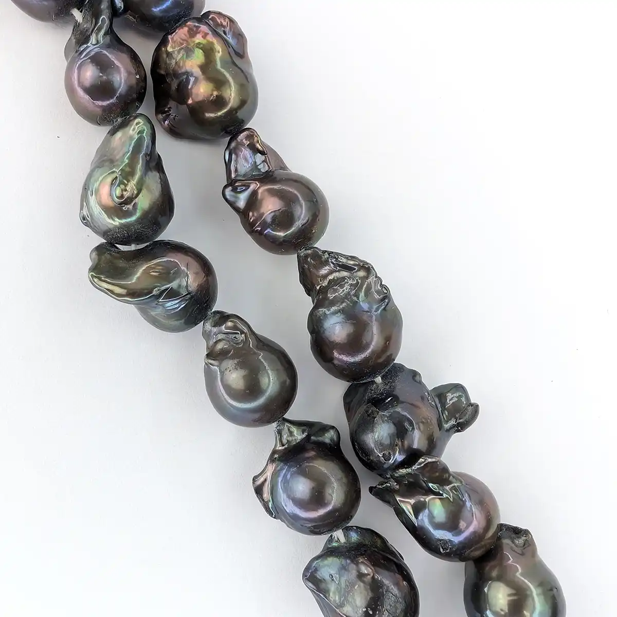 Peacock black medium fireball pearls