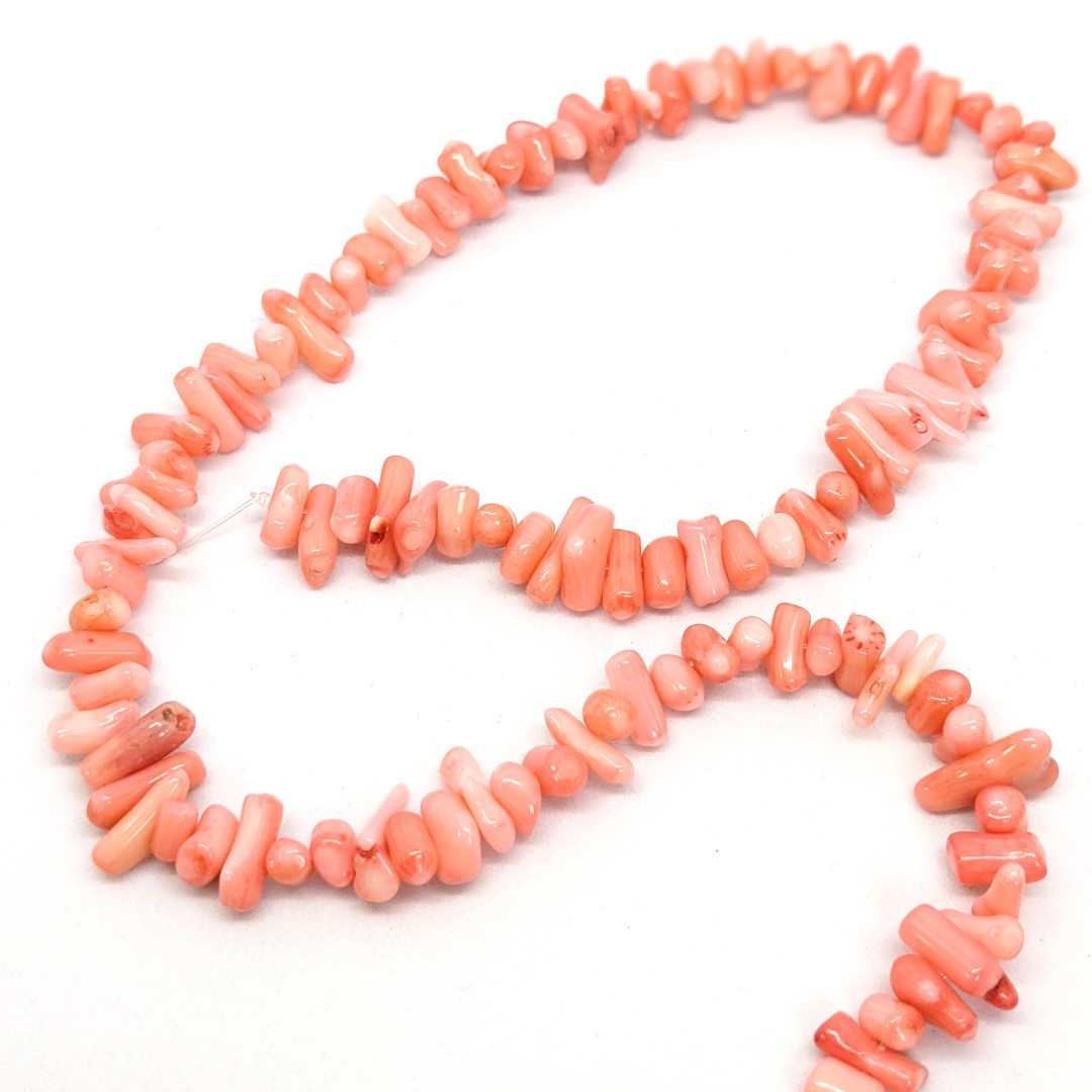 Pink bamboo coral chips - Pearls Direct